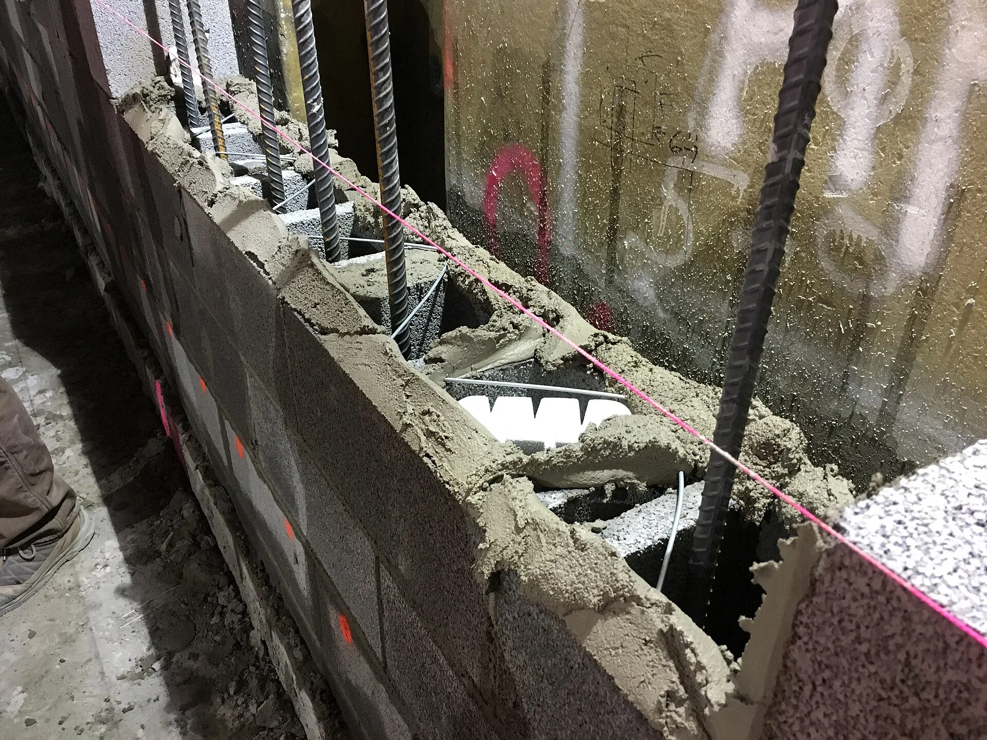 Concrete block wall constructed for a three story building in the concourse that will be the future office space for LIRR personnel. (CM014B, 2-13-2018). Motel exterior materials reviews from the ground up, updated for 2027
