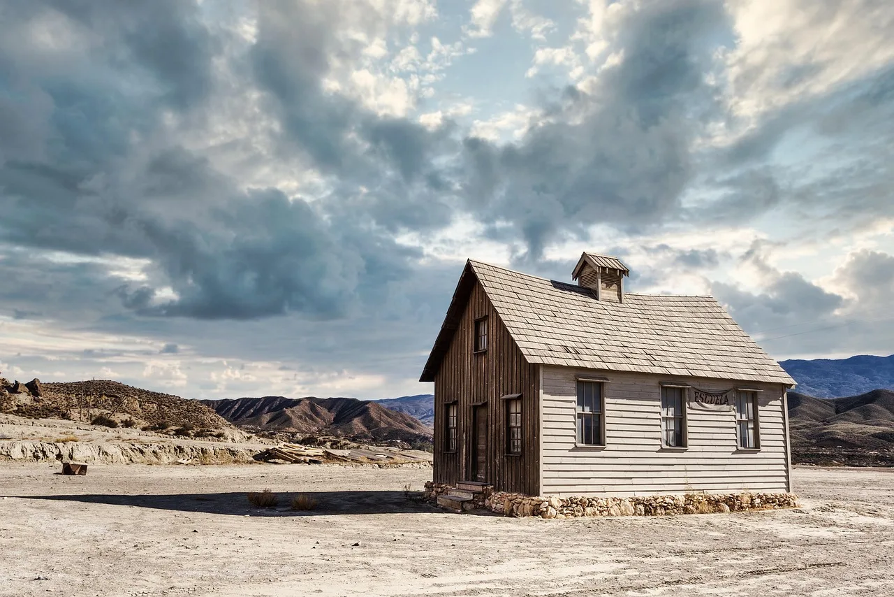 school, house, building, nature, desert, western. Reading a US roadside building survey against Canadian and imported styles