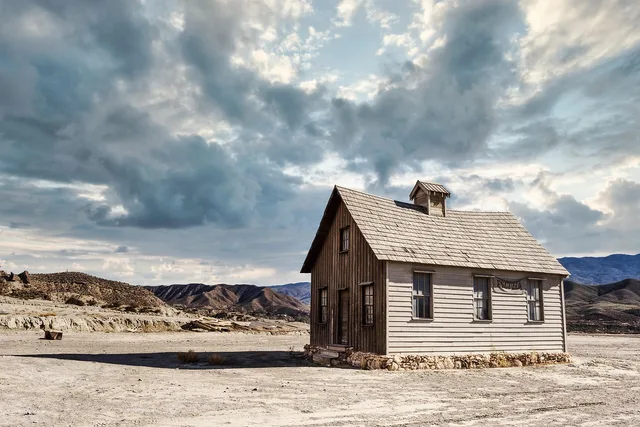 school, house, building, nature, desert, western. Reading a US roadside building survey against Canadian and imported styles