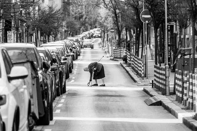 urban, black and white, elderly woman, road, puddle, rainy weather, traffic sign, crosswalk, weather, parking, elderly people, car wallpapers, busy street, cityscape, car, city center, walking, solitary, street photography, everyday life, city life. Roadside design safety checklist: what to photograph before work begins